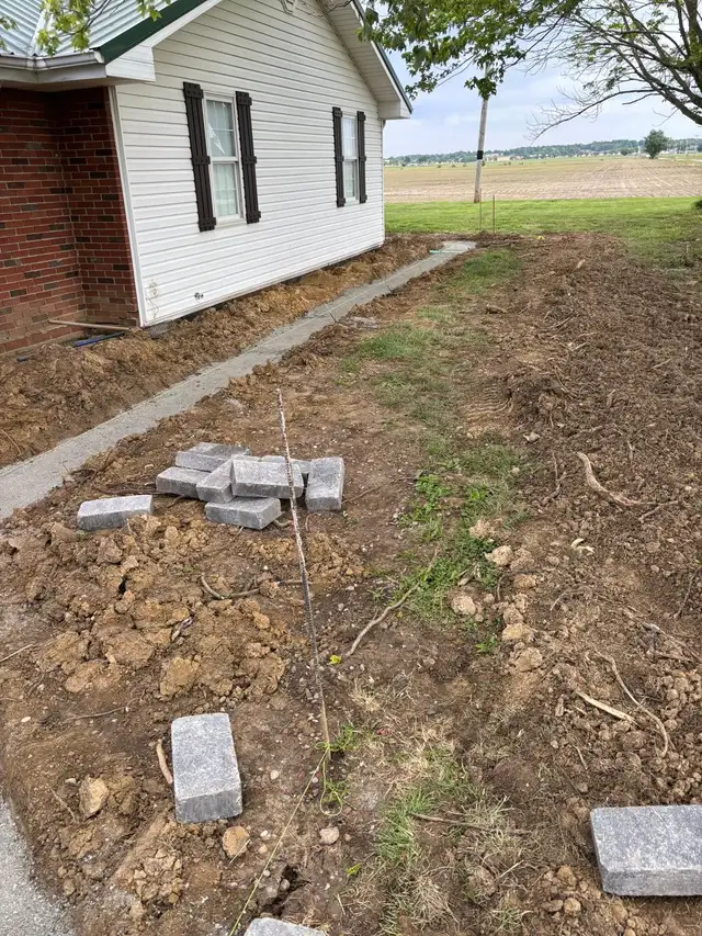 Prepared soil and the outline of a garden border.